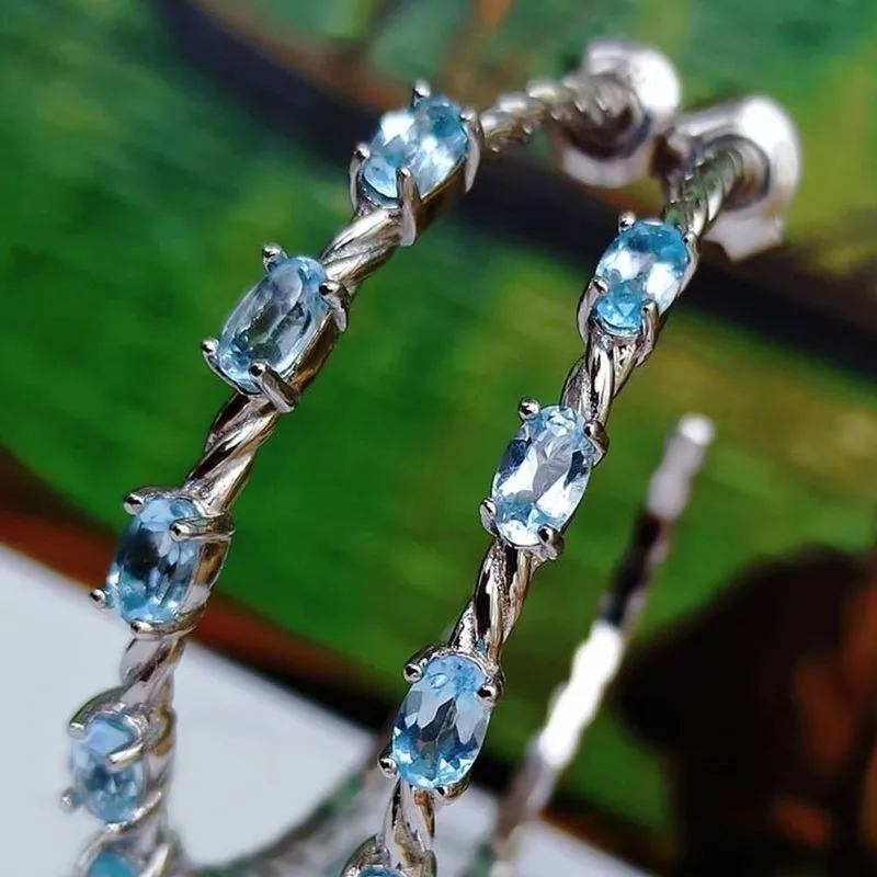Sky Blue Topaz in Twisted S925 Silver Hoop Earrings